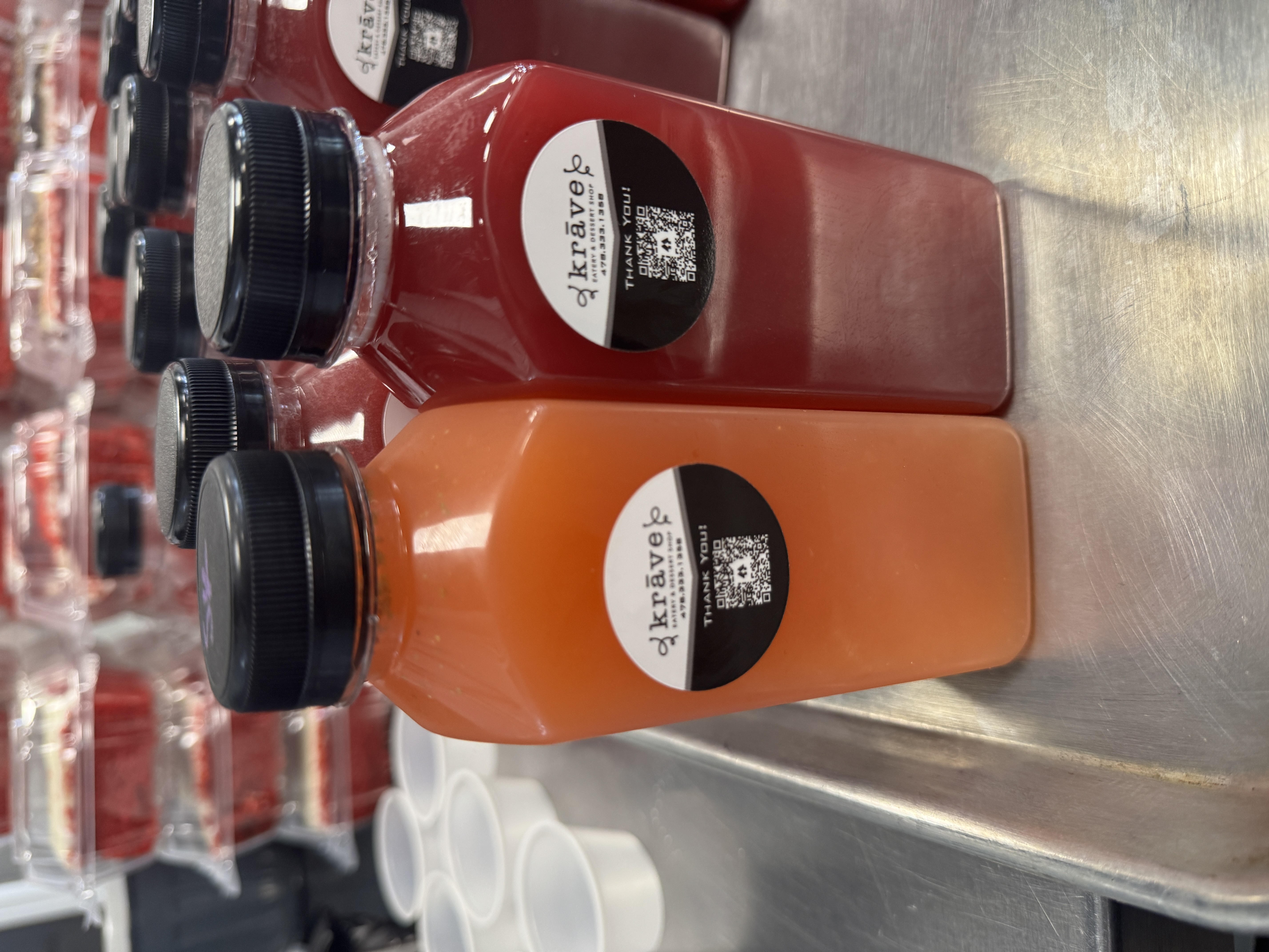 Red and orange bottled Krave drinks